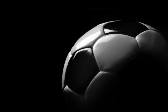 soccer ball isolated in black