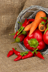 fresh red vegetables on sackcloth background