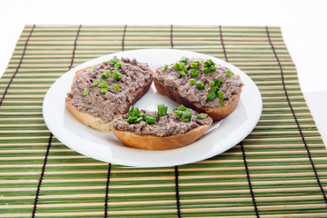 Sandwich with liver cheese spread and chopped green onions
