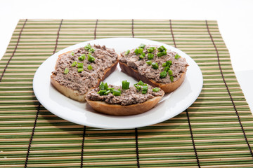 Sandwich with liver cheese spread and chopped green onions