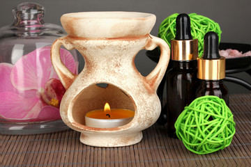 Aromatherapy lamp on grey background