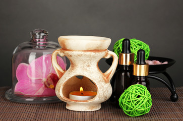 Aromatherapy lamp on grey background