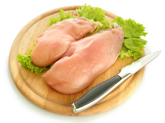 raw chicken meat on cutting board, isolated on white