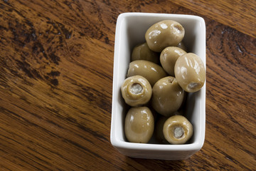 Green Olives in a White Bowl