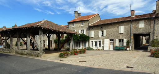 Panorama in the village of Mortemart with its ancient covered market hall, Limousin, France
