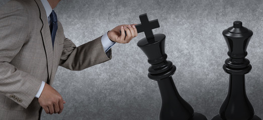 Fototapeta premium Businessman hand moving chess