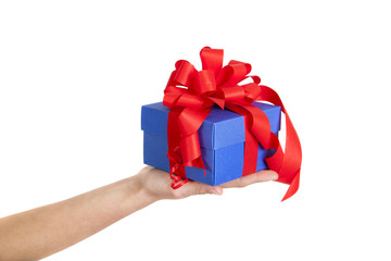 blue gift box with red ribbon in woman hand