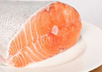 Fresh salmon red fish with lemon and spices