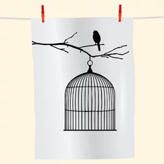 Papier Peint photo Lavable Oiseaux en cages Oiseau sur une branche et une cage à oiseaux