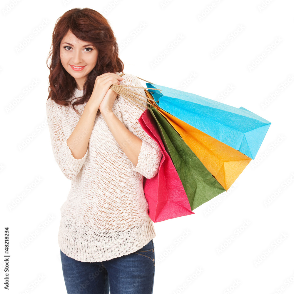 Wall mural Pretty woman with shopping bags