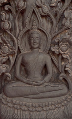 Fototapeta na wymiar drewniany Budda