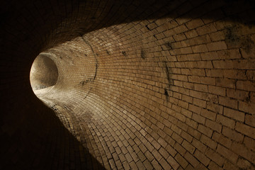 Brick corridor in underground old sewage treatment plant