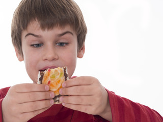 boy eating a cake