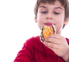 boy eating a cake