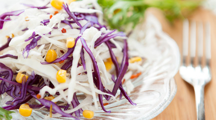 fresh cabbage salad and of canned corn