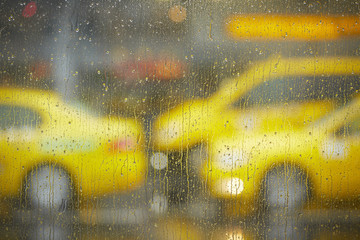 Taxi cars in rain