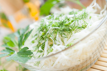 Crispy cabbage salad in a glass bowl