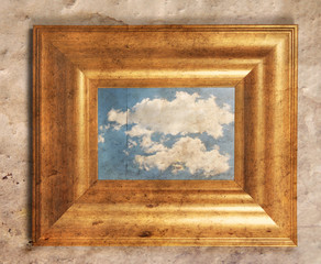 a distressed frame with a cloud in it