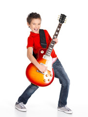 white boy sings and plays on the electric guitar