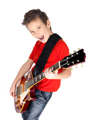 Portrait of young boy with  electric guitar