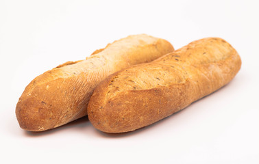 baked baguette bread rolls isolated on white