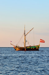 old historical sail ship at the sunset