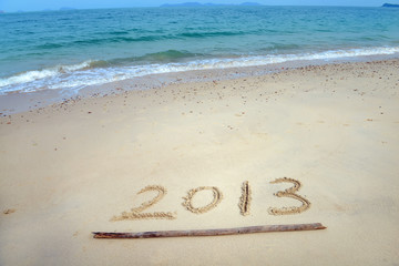 number 2013 on the beach of sunrise