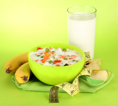 tasty dieting food, fruits and glass of milk,
