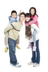 Fototapeta premium full length of happy asian family isolated on white