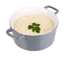 Mashed potatoes in saucepan isolated on white