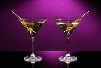 Martini glasses on dark background