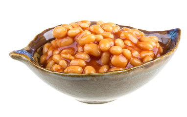 Marinated haricot beans in tomato sauce with shallots on a plate