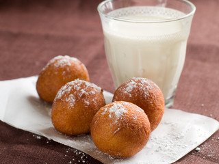 Doughnuts with glass of milk