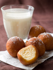 Doughnuts with glass of milk