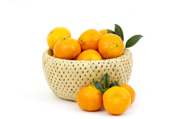 tangerines in a basket on white background
