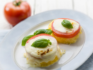 mozzarella tomatoes and porridge, selective focus