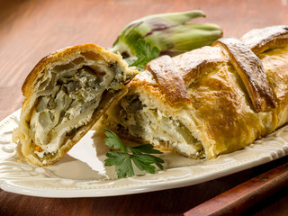 strudel with artichoke and ricotta, vegetarian food