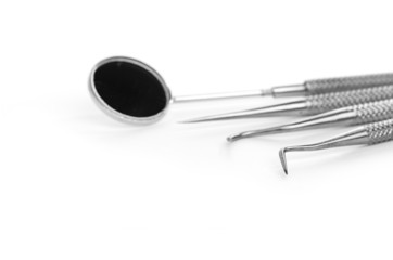 Basic dentist tools isolated on white