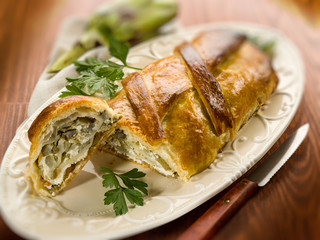 strudel with artichoke and ricotta, selective focus