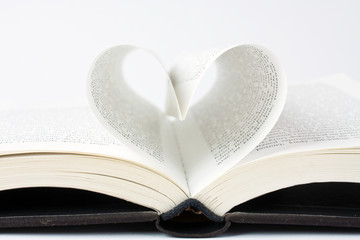 Book with pages folded into a heart shape