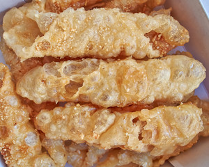 Diples, traditional Greek sweet fries with honey syrup and nuts