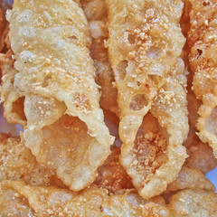 Diples, traditional Greek sweet fries with honey syrup and nuts