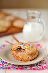 Iced toaster pastries with milk jug