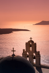 Sunset behind Firostefani church, Santorini