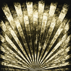 Brown grunge sunbeams background or texture