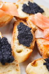 Crostini with salmon and caviar