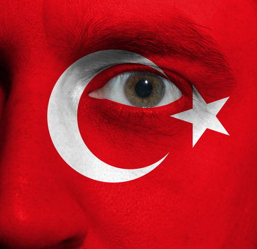 face with the Turkish flag painted on it