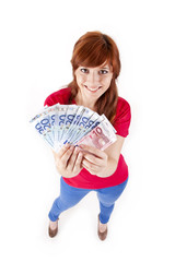 Happy woman showing Euros currency notes