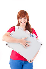 Naklejka premium Woman holding metal grey case with money