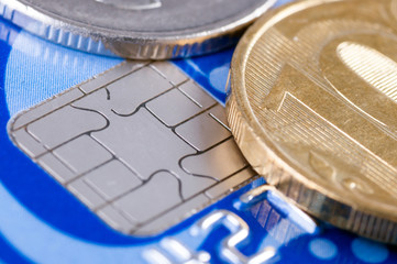 Credit card and coins
